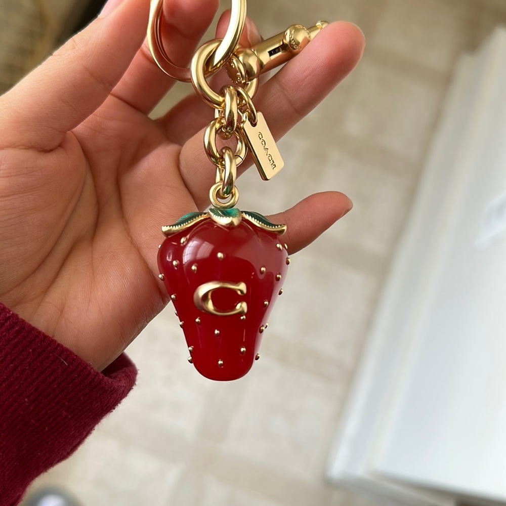 Coach strawberry keychain
